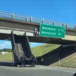 VIDEO: Camión volquete queda atascado bajo un puente y provoca el caos en una autopista